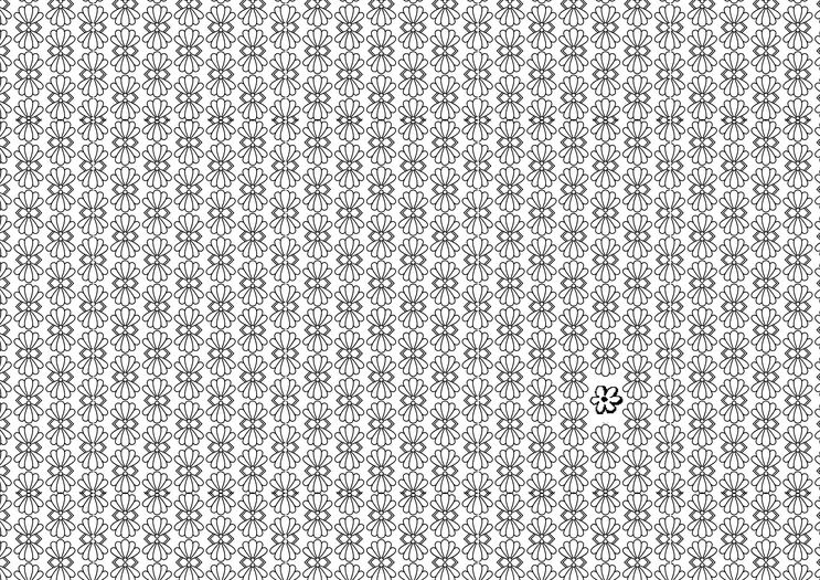 A pattern of flowers interrupted at one point by a flower that doesn't fit the pattern.